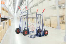 Ergonomia i bezpieczeństwo przy transporcie ciężkich ładunków – dobre praktyki z wózkami Domino 